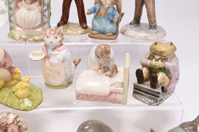 Lot 5 - A group of Beswick and Royal Albert Beatrix Potter figures, with book and bookplate and other items