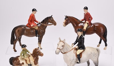 Lot 23 - A Beswick Hunting set including riders, foxes and hounds