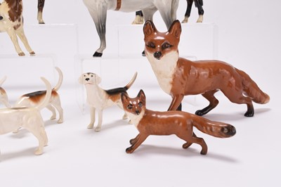 Lot 23 - A Beswick Hunting set including riders, foxes and hounds