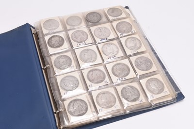 Lot 314 - Album containing approximately 230 silver, cupro-nickel and bronze U.K and foreign coinage