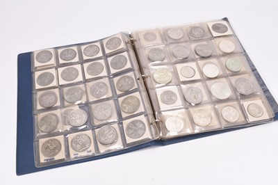 Lot 314 - Album containing approximately 230 silver, cupro-nickel and bronze U.K and foreign coinage