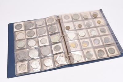 Lot 314 - Album containing approximately 230 silver, cupro-nickel and bronze U.K and foreign coinage
