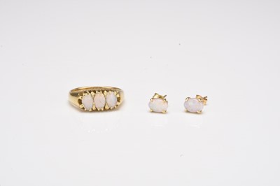 Lot 269 - An opal ring and a pair of opal earrings
