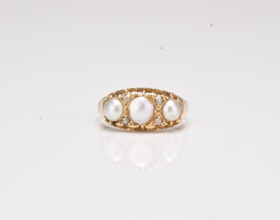 Lot 298 - An Edwardian 18ct gold pearl and diamond ring