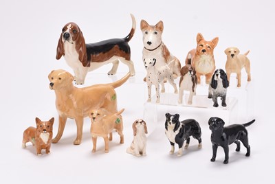 Lot 361 - A collection of Beswick dogs and two Sylvac dogs