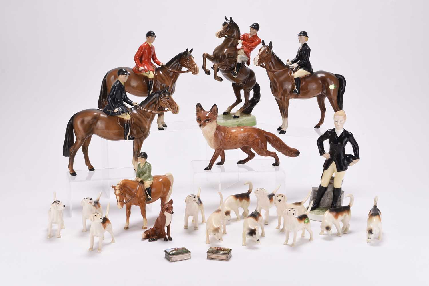 Lot 22 - A Beswick hunting set including riders, foxes and hounds