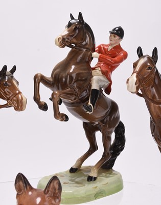 Lot 22 - A Beswick hunting set including riders, foxes and hounds