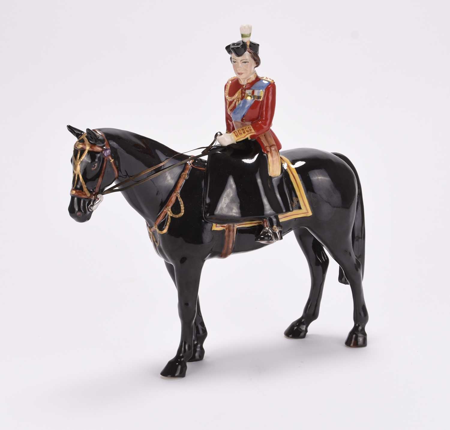 Lot 10 - Beswick Trooping the Colour model of HM Queen Elizabeth II on Burmese