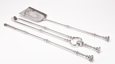 Lot 57 - A set of 19th century polished steel fire tools
