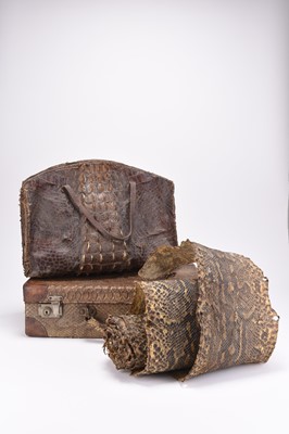 Lot 200 - An Edwardian snake skin dressing case, a 'hornback' crocodile bag and a rolled snake skin