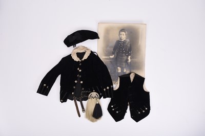 Lot 230 - A Victorian child's black velvet jacket and waistcoat