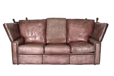 Lot 114 - A knole type leather three-seater sofa