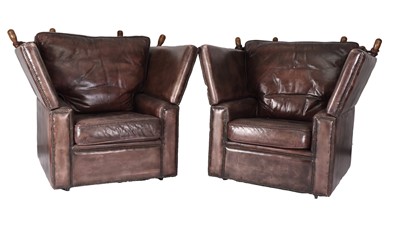 Lot 115 - A pair of knole type leather armchairs