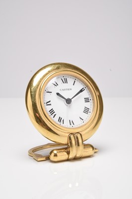 Lot 400 - Cartier: A gilt brass desk alarm clock