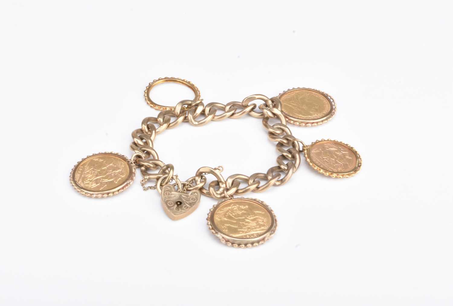 Lot 240 - A 9ct gold sovereign and half sovereign set bracelet