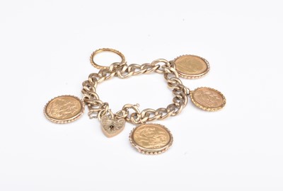 Lot 240 - A 9ct gold sovereign and half sovereign set bracelet