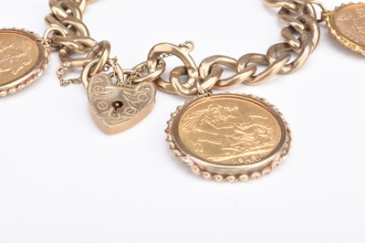 Lot 240 - A 9ct gold sovereign and half sovereign set bracelet