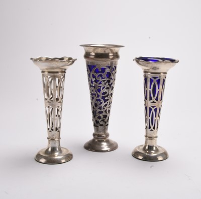 Lot 104 - Three silver mounted vases