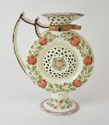 Lot 98 - An English pearlware puzzle jug, probably Leeds, circa 1800