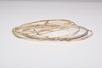 Lot 322 - A collection of five bangles