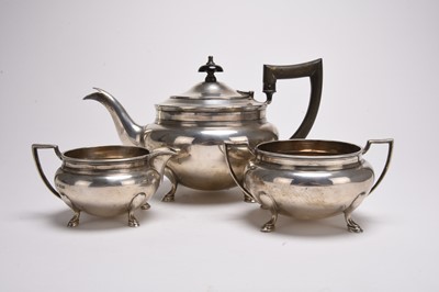 Lot 134 - A three piece silver tea service