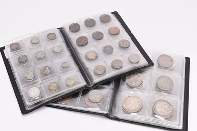 Lot 325 - Two coin collection books and other coinage