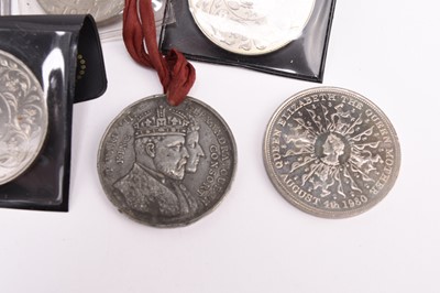 Lot 325 - Two coin collection books and other coinage