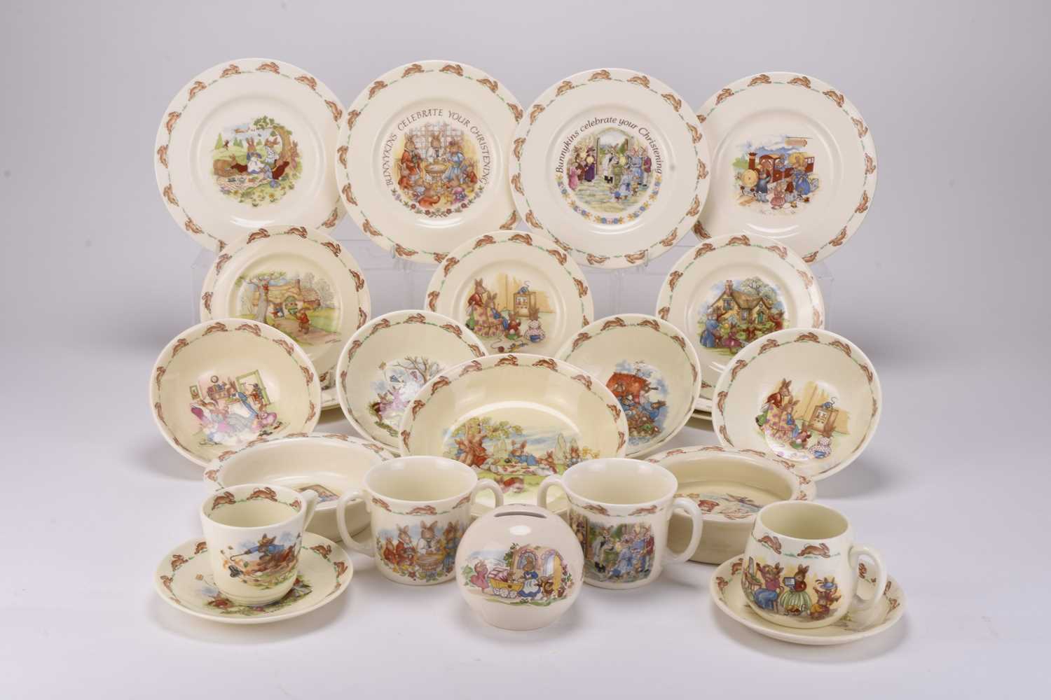Lot 10 - A large collection of Peter Rabbit and Bunnykins ceramics, with related poster and toy