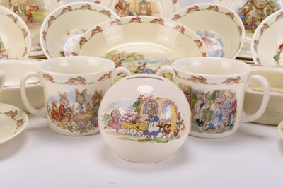 Lot 10 - A large collection of Peter Rabbit and Bunnykins ceramics, with related poster and toy