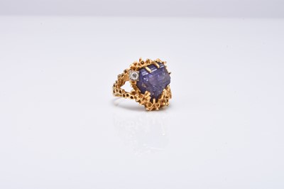 Lot An 18ct gold rough amethyst crystal and brilliant cut diamond ring