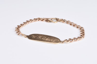 Lot 241 - A 9ct gold curb link identity bracelet