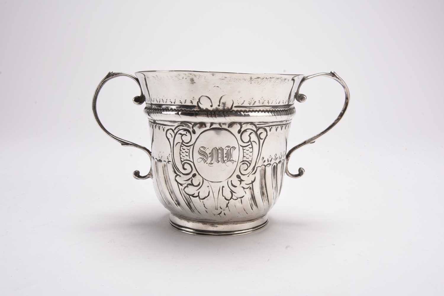 Lot 35 - A George I silver two handled loving cup