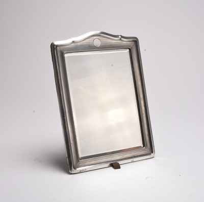 Lot 141 - A silver mounted rectangular mirror