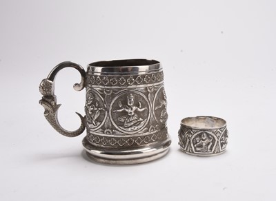 Lot 38 - An Indian white metal mug