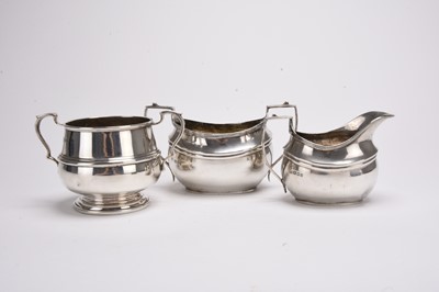 Lot 25 - A silver sugar bowl and cream jug and a further silver sugar bowl