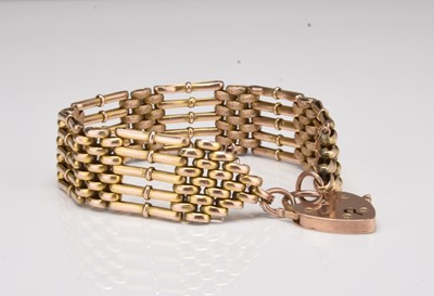 Lot 271 - A yellow metal five bar gate link bracelet