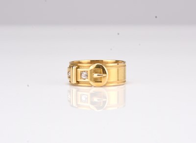 Lot An Edwardian 18ct gold old cut diamond set stylised buckle ring