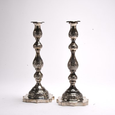 Lot 35 - A pair of silver candlesticks