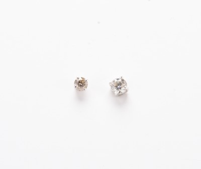Lot 209 - Two brilliant cut diamond stud earrings