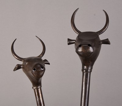 Lot 61 - Two Persian bull's head maces, Qajar Dynasty, 19th century