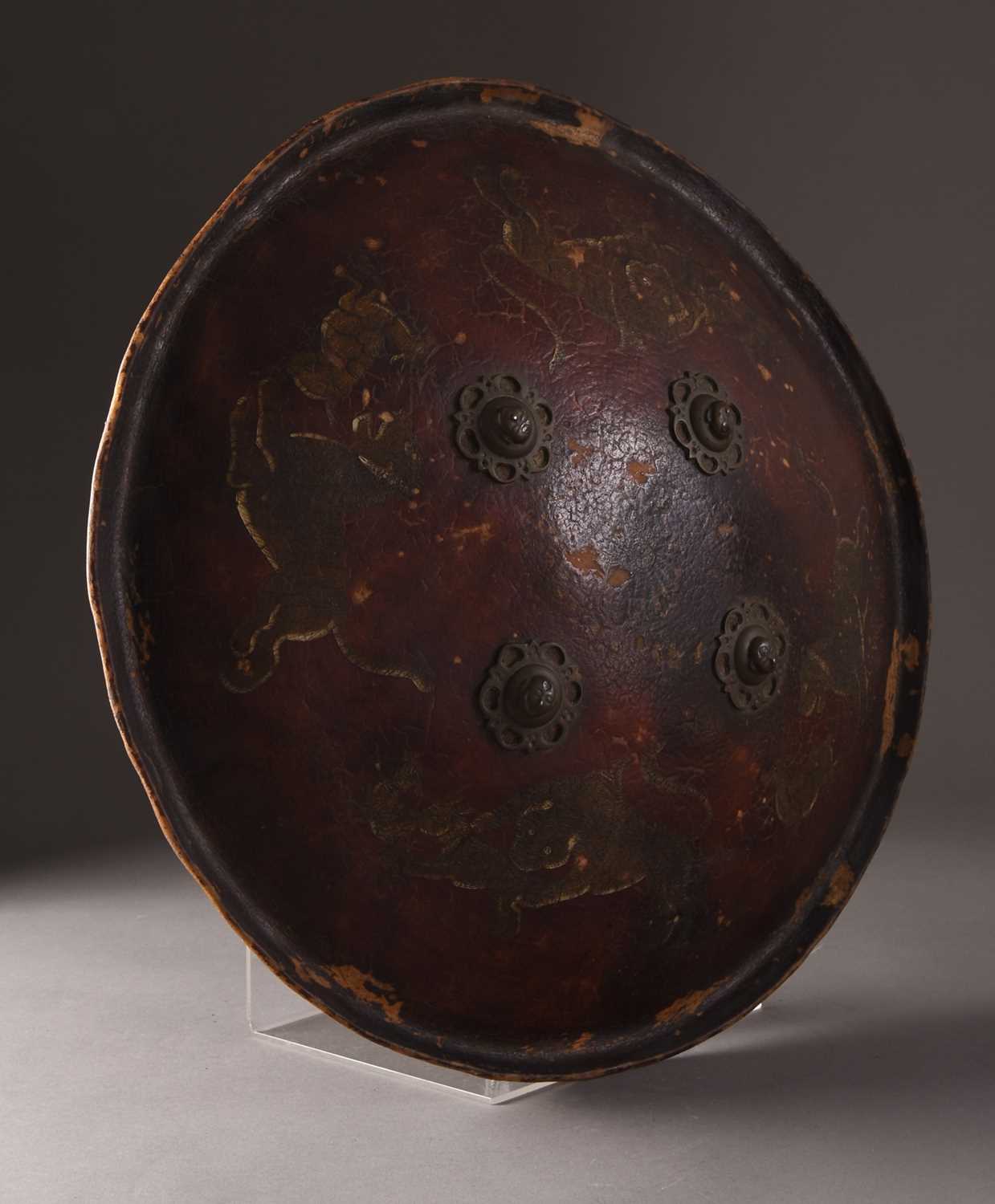 Lot 20 - A painted hide leather shield or Dhal, Northern India, 19th century