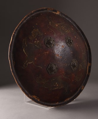 Lot 20 - A painted hide leather shield or Dhal, Northern India, 19th century