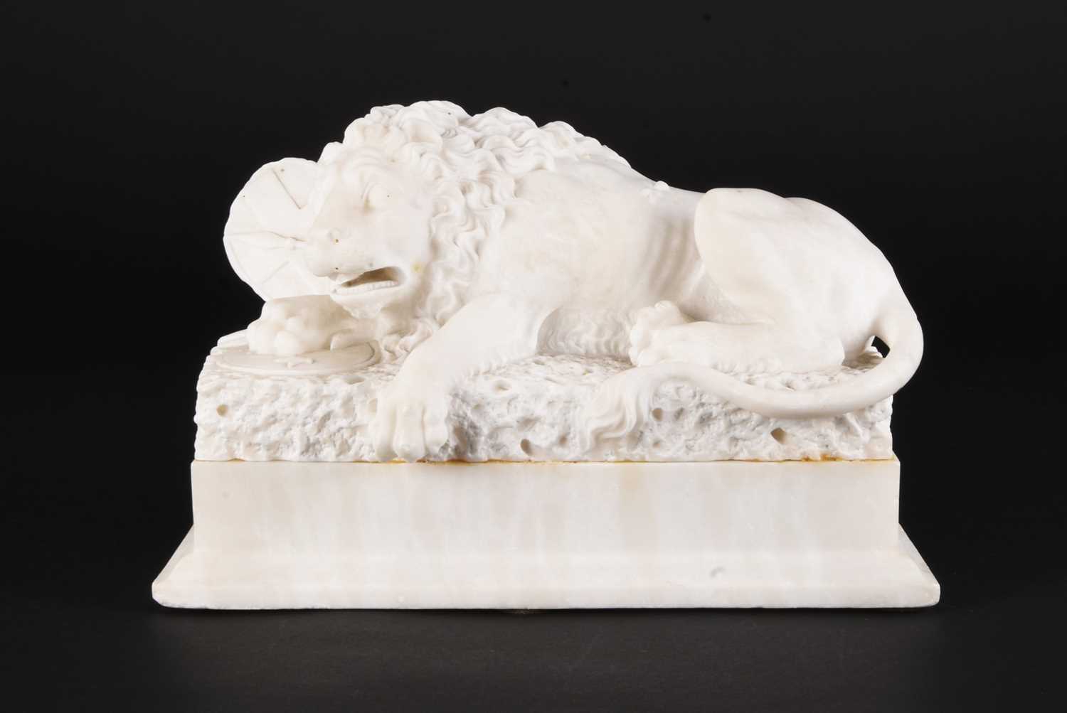 Lot 72 - An Italian alabaster figure of a lion, late 19th century