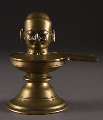 Lot 14 - A bronze Shiva lingam, India, 18th/19th century