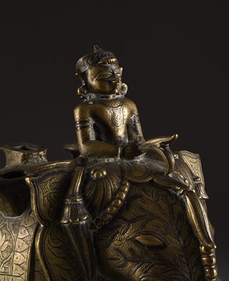 Lot 15 - A silver inlaid bronze elephant, India, 18th/19th century