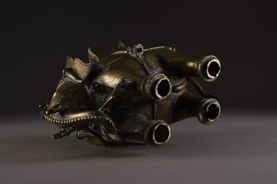 Lot 15 - A silver inlaid bronze elephant, India, 18th/19th century