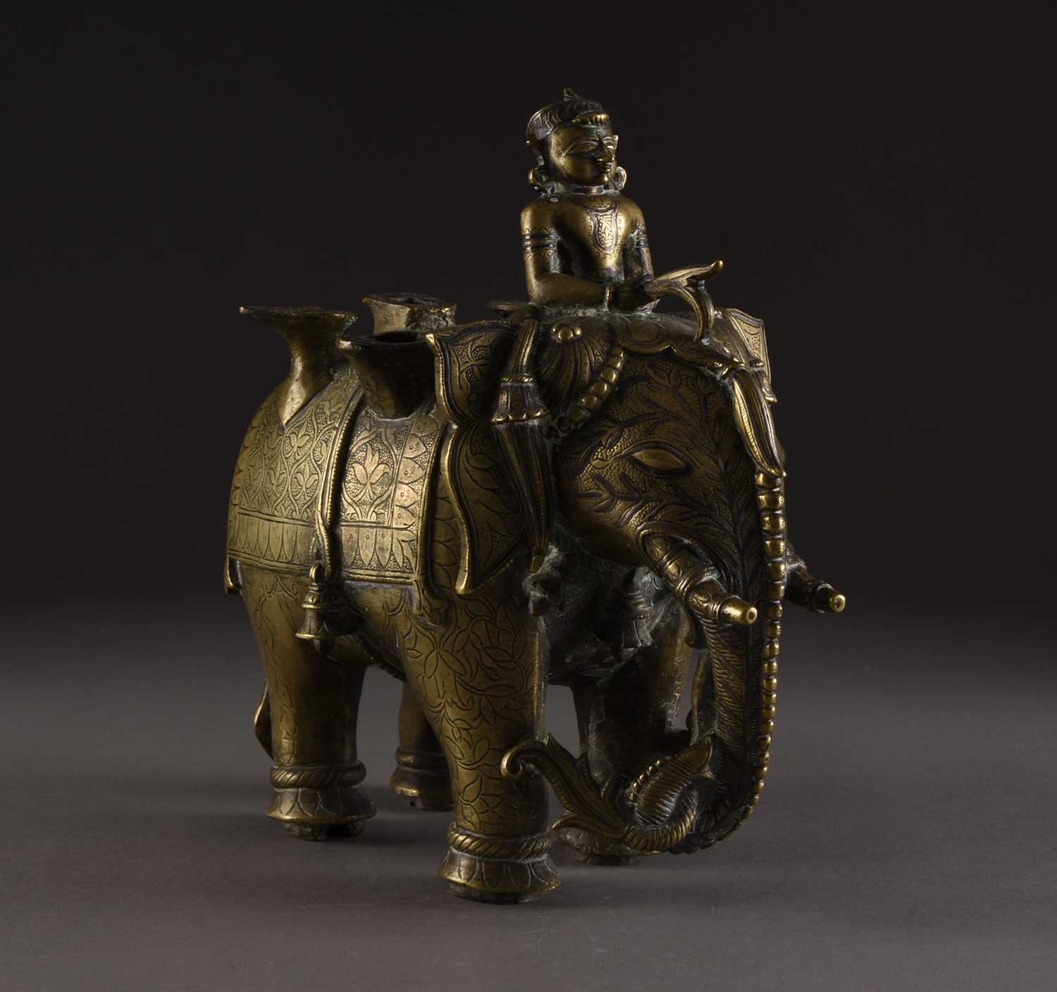 Lot 15 - A silver inlaid bronze elephant, India, 18th/19th century