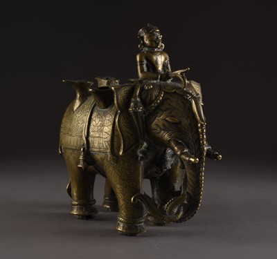 Lot 15 - A silver inlaid bronze elephant, India, 18th/19th century