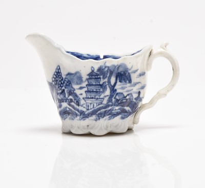 Lot 35 - A late Caughley Chelsea cream ewer in the 'Tower' pattern, circa 1790