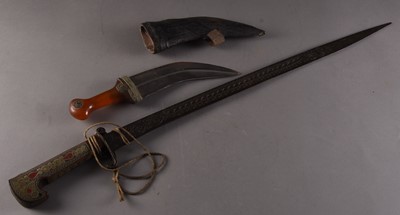 Lot 224 - An Algerian decorative sword and a near Eastern Jambiya dagger